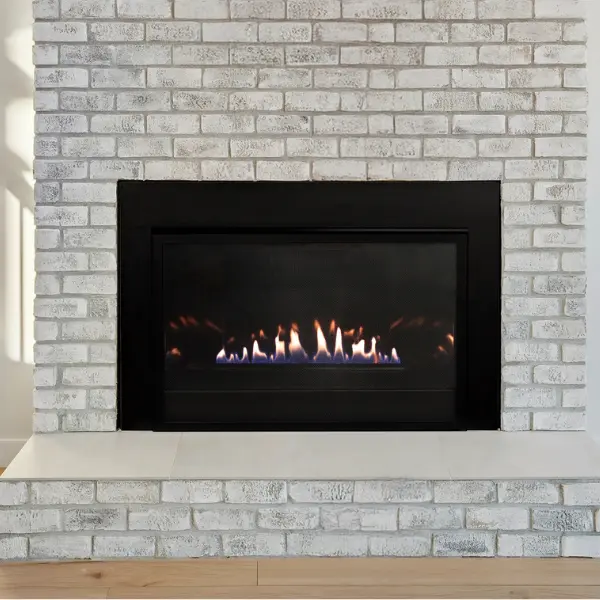 Empire Loft contemporary direct vent gas fireplace insert with linear burner and modern fire glass media