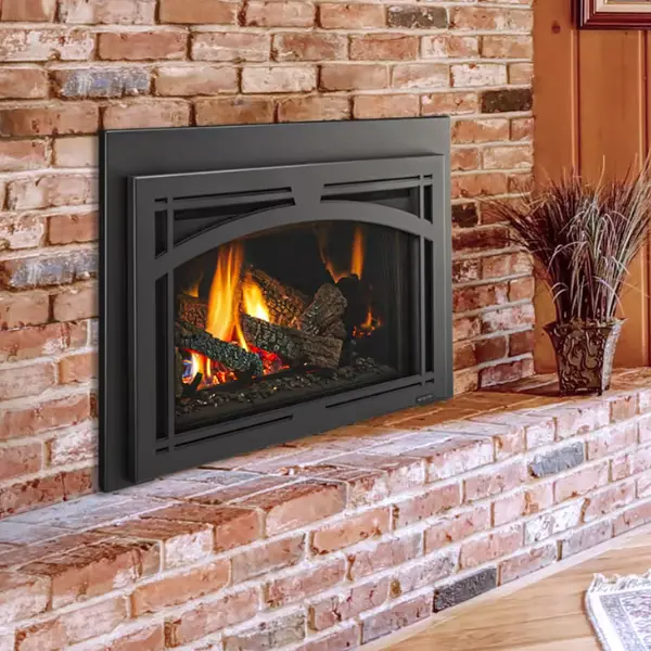 Majestic Trilliant direct vent gas fireplace insert with decorative arch front and realistic log set