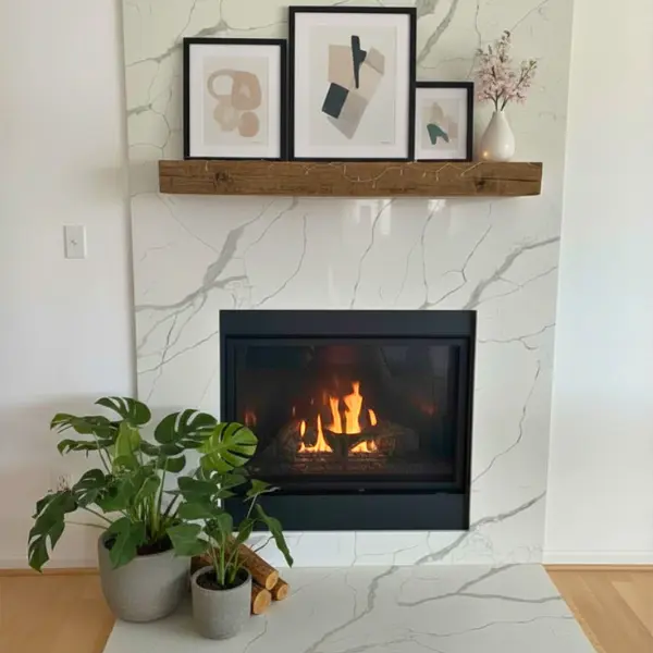 Custom direct vent gas fireplace remodel with large porcelain slab surround in Virginia Beach VA