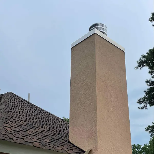 Prefab chimney constructed for a factory built wood burning fireplace system in Virginia Beach VA